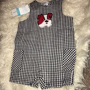 Black and white “Dawgs” John John